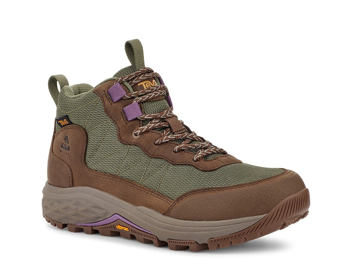 Green and brown hiking boot with Vibram sole and purple lace accents, outdoor footwear