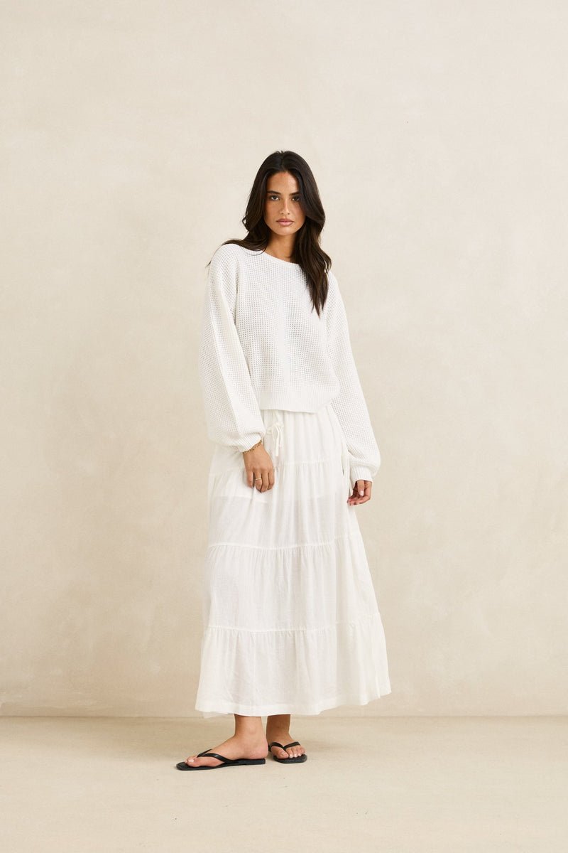 White open-knit long sleeve jumper with relaxed fit and ribbed cuffs