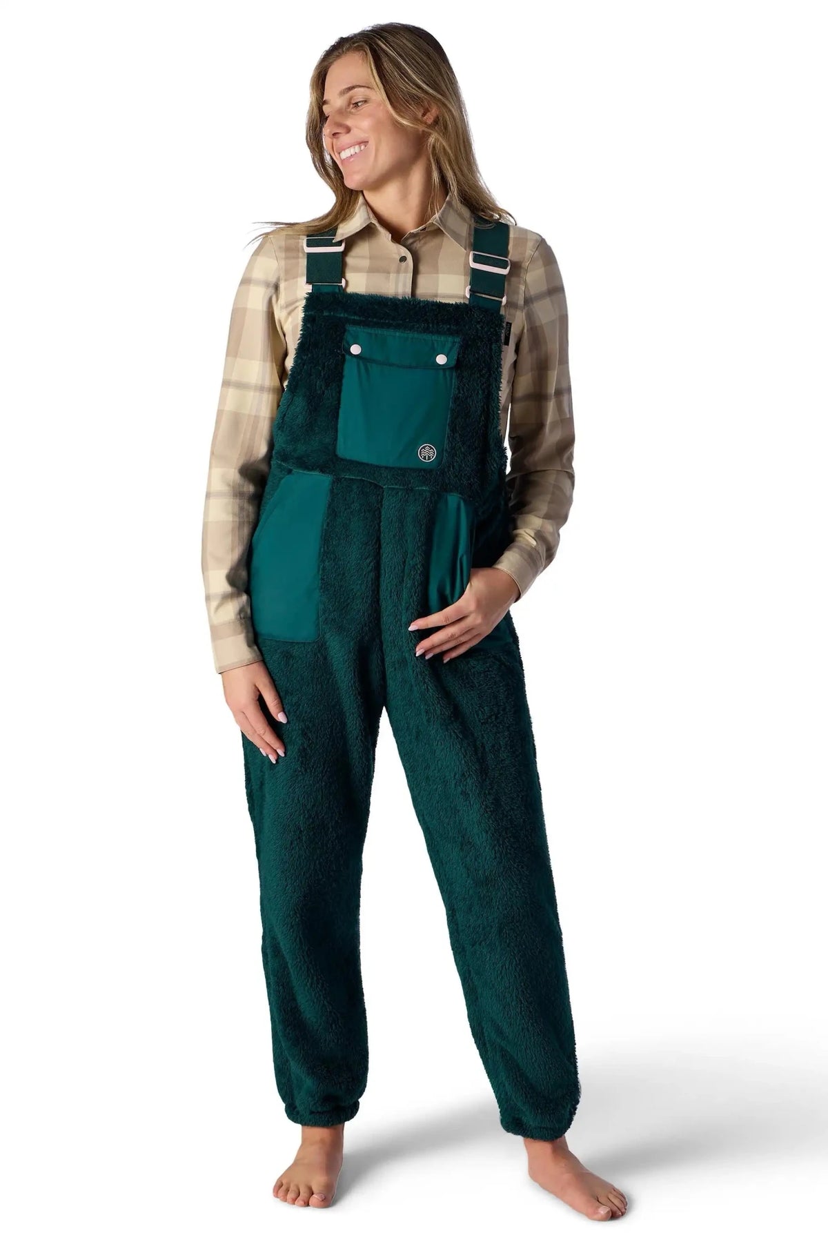 Women's sherpa fleece bib overall with adjustable straps, bib pocket, and jogger-style cuffs