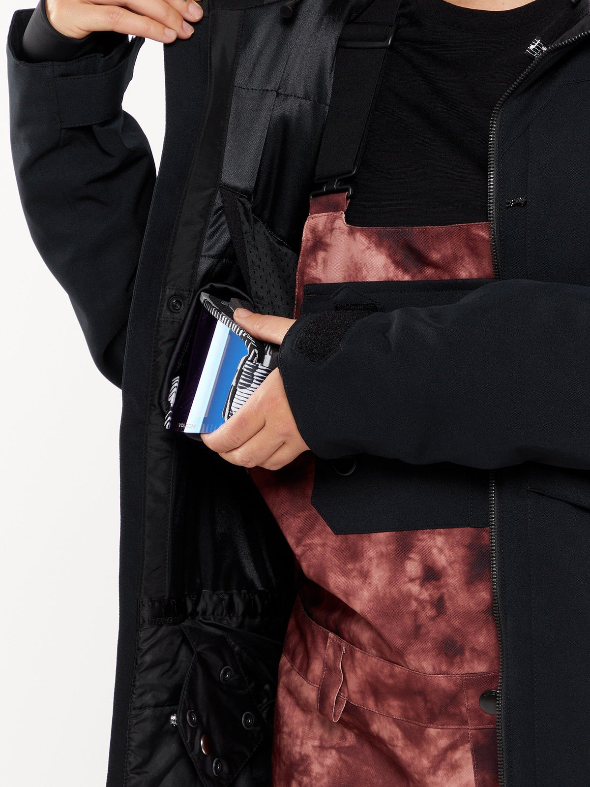 Volcom Shelter 3D Stretch Jacket interior detail showing inner pocket with phone storage feature