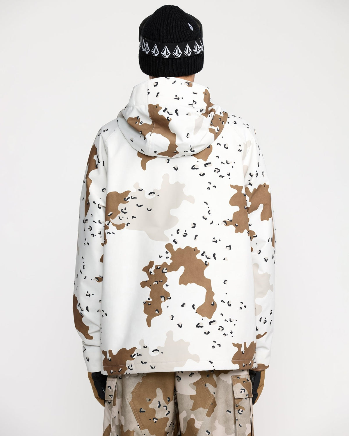 Volcom men's double insulated jacket shown from back with matching camo pants and beanie