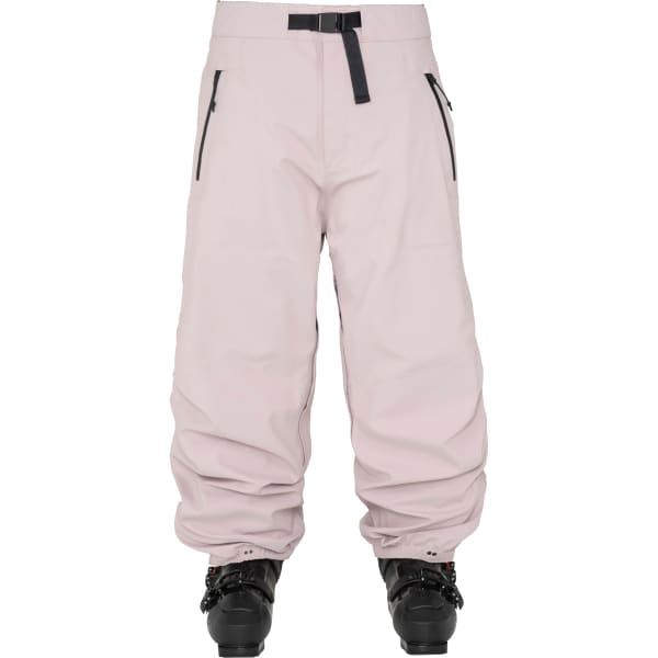 Armada Chromatic 3L ski pants with belt buckle and zippered pockets shown with ski boots