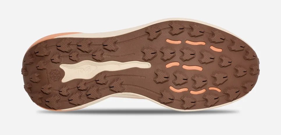 Brown and peach trail running shoe sole with rugged, grippy tread pattern for women