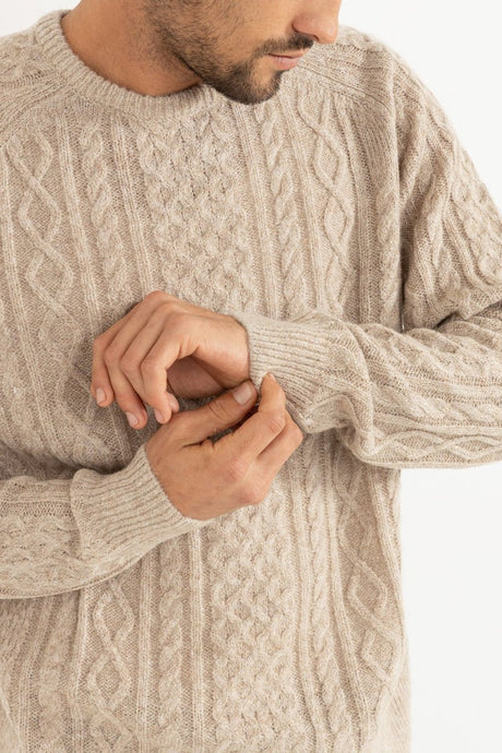 Sleeve and collar details highlighting plush mohair construction in oatmeal