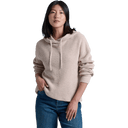 Women's beige ribbed knit hoodie sweater with drawstring and blue jeans