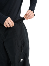 Burton women's relaxed fit snow pants with velcro waist adjustment and zippered pocket detail