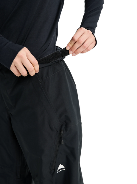 Burton women's relaxed fit snow pants with velcro waist adjustment and zippered pocket detail