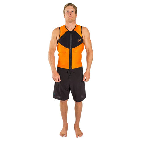 Man wearing an orange and black water sports vest and black board shorts, standing barefoot.