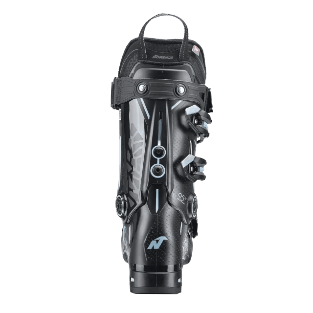 Nordica women's alpine ski boot with four buckle closure and pull loop on transparent background