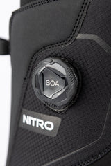 Close-up of Nitro snowboard boot featuring BOA M2 dial closure system on textured upper.
