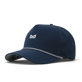 Melin navy blue perforated snapback cap with white crown logo and rope brim detail