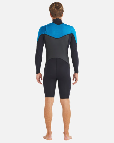 Men's black and blue long-sleeve springsuit wetsuit, back view, chest-zip design