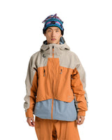 Burton AK Swash insulated Gore-Tex jacket shown on model with colorblock paneling and hood