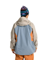 Burton AK Swash insulated Gore-Tex jacket shown from rear on male model with colorblock design