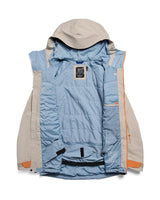 Burton AK Swash insulated Gore-Tex jacket shown open displaying quilted interior lining and multiple pockets
