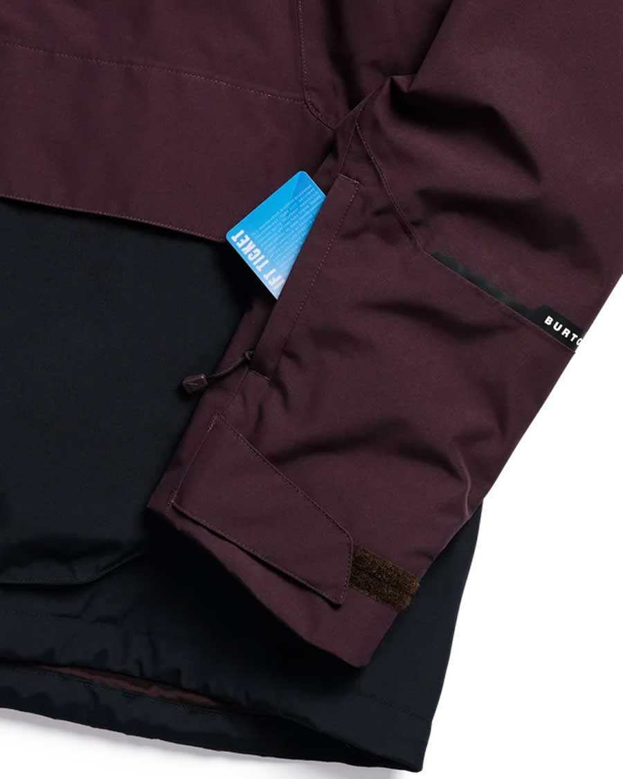 Burton women's two-tone anorak sleeve detail showing lift ticket pocket with card inserted