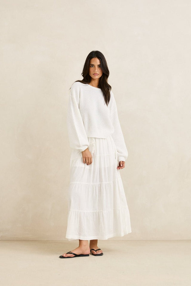 White open-knit long sleeve jumper with relaxed fit and ribbed cuffs