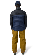 Men's technical ski pants with reinforced cuffs, shown from behind on a model.