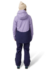 Women's two-tone ski jacket with hood shown from back, paired with matching snow pants