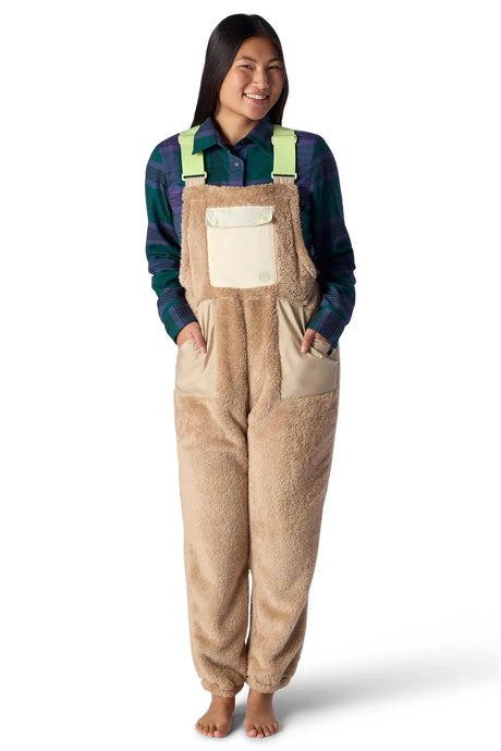 Women's sherpa fleece bib overalls with bright green straps and contrast chest pocket