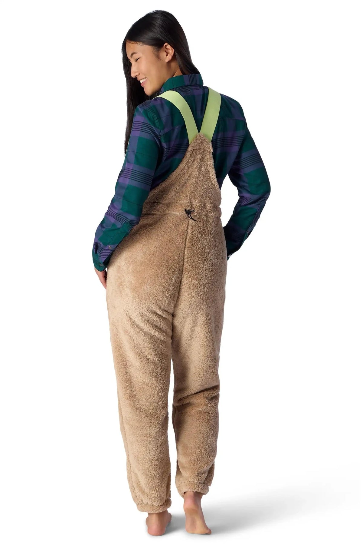 Women's sherpa fleece bib overall pants with adjustable straps, rear view on model