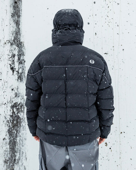 Men's quilted puffer jacket with hood, back view, shown in snowy outdoor setting
