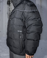 Volcom men's puffer jacket with quilted panels, hood, and side zip pocket