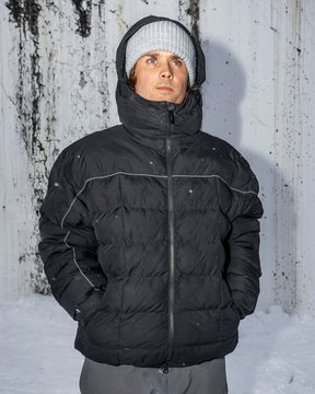 Men's insulated puffer jacket with hood, reflective piping, and front zip closure