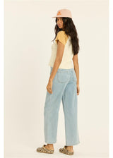 Women's short-sleeve colorblock knit crop top with contrast sleeves, shown from back