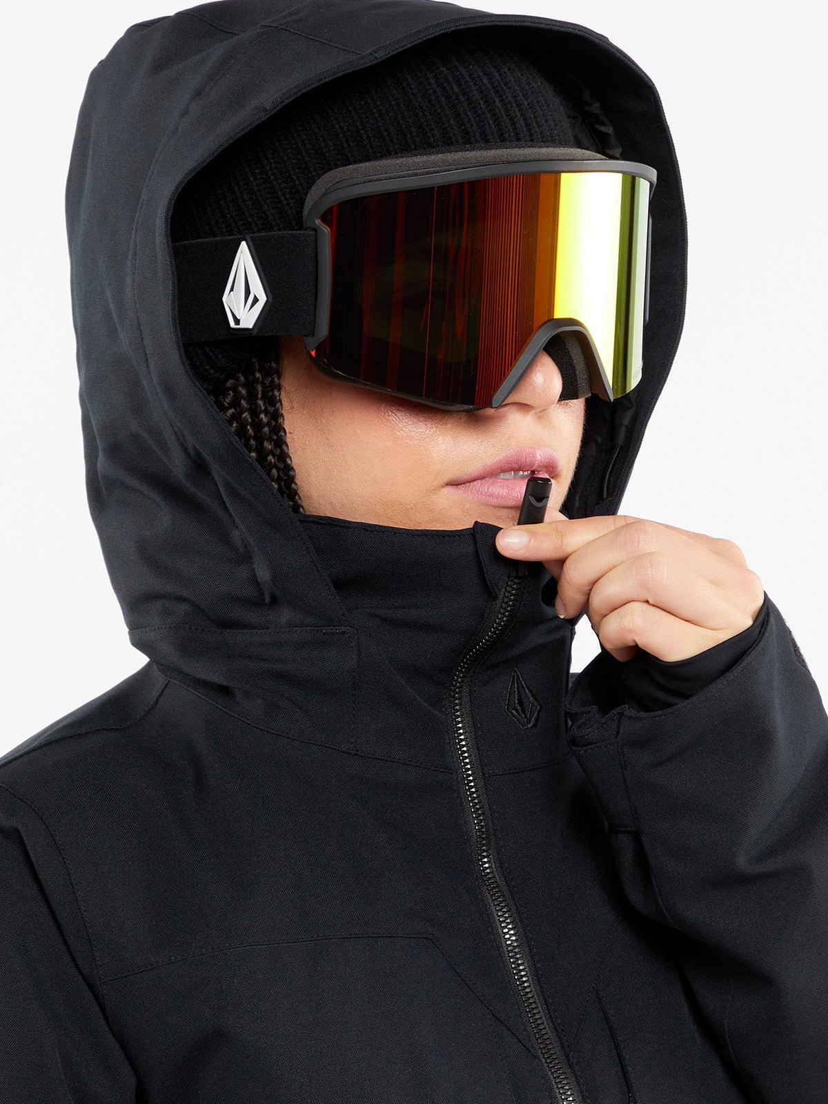 Volcom women's hooded ski jacket with goggle compatibility shown in close-up detail shot