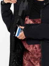Volcom Shelter 3D Stretch Jacket interior detail showing inner pocket with phone storage feature