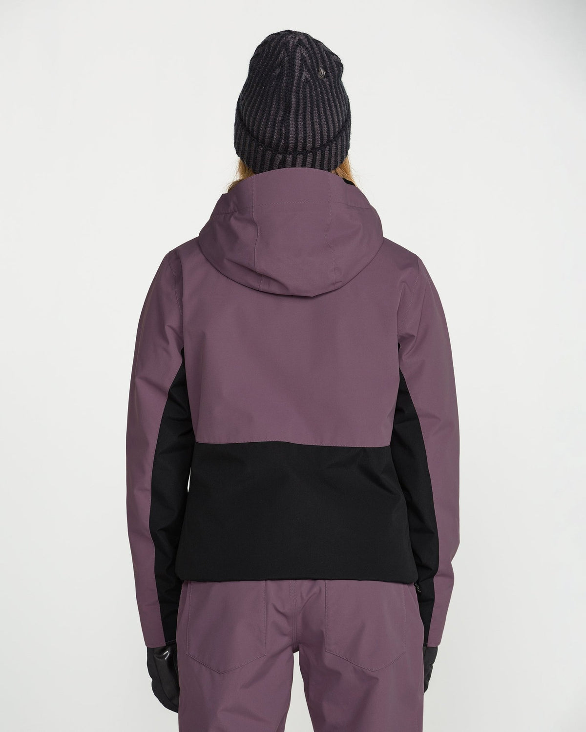 Women's insulated snowboard jacket with hood, colorblock design, shown from back view