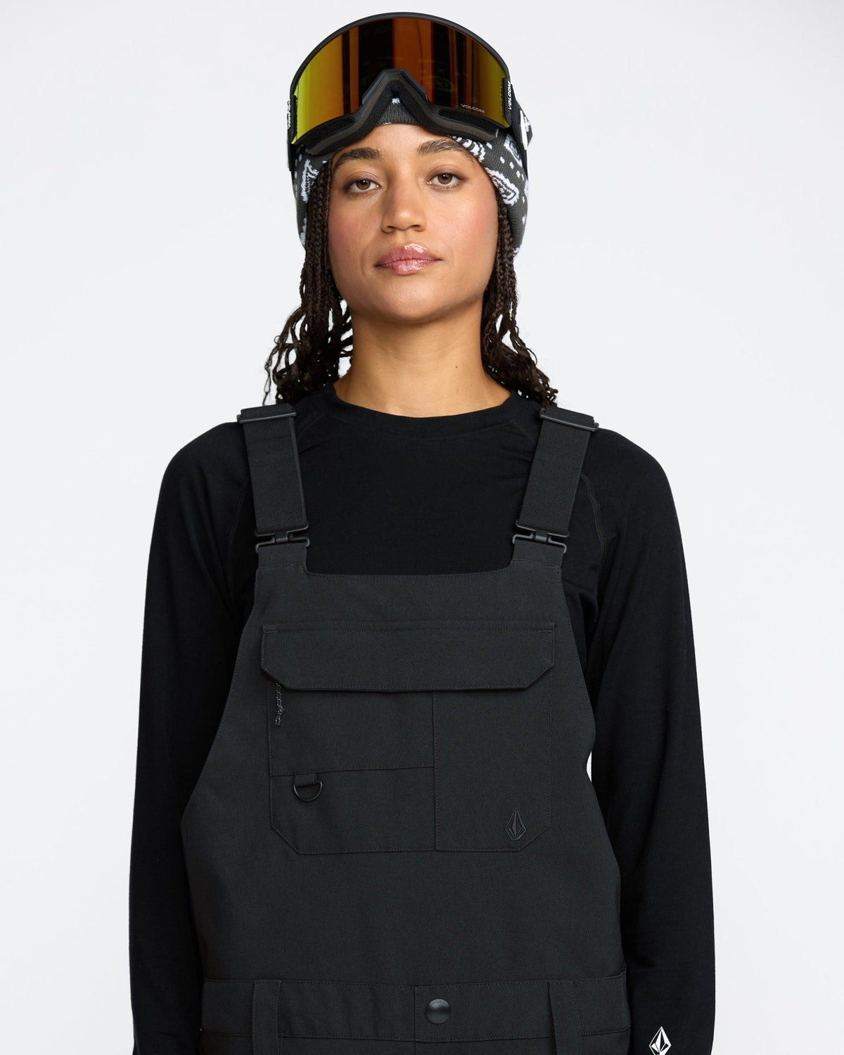 Volcom women's stretch bib overall with adjustable straps and chest pocket, modeled on figure