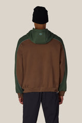 Men's heavyweight colorblock pullover hoodie with contrasting panels, rear view on model