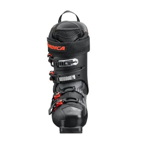 Nordica alpine ski boot with four buckle closure system and pull loop on white background