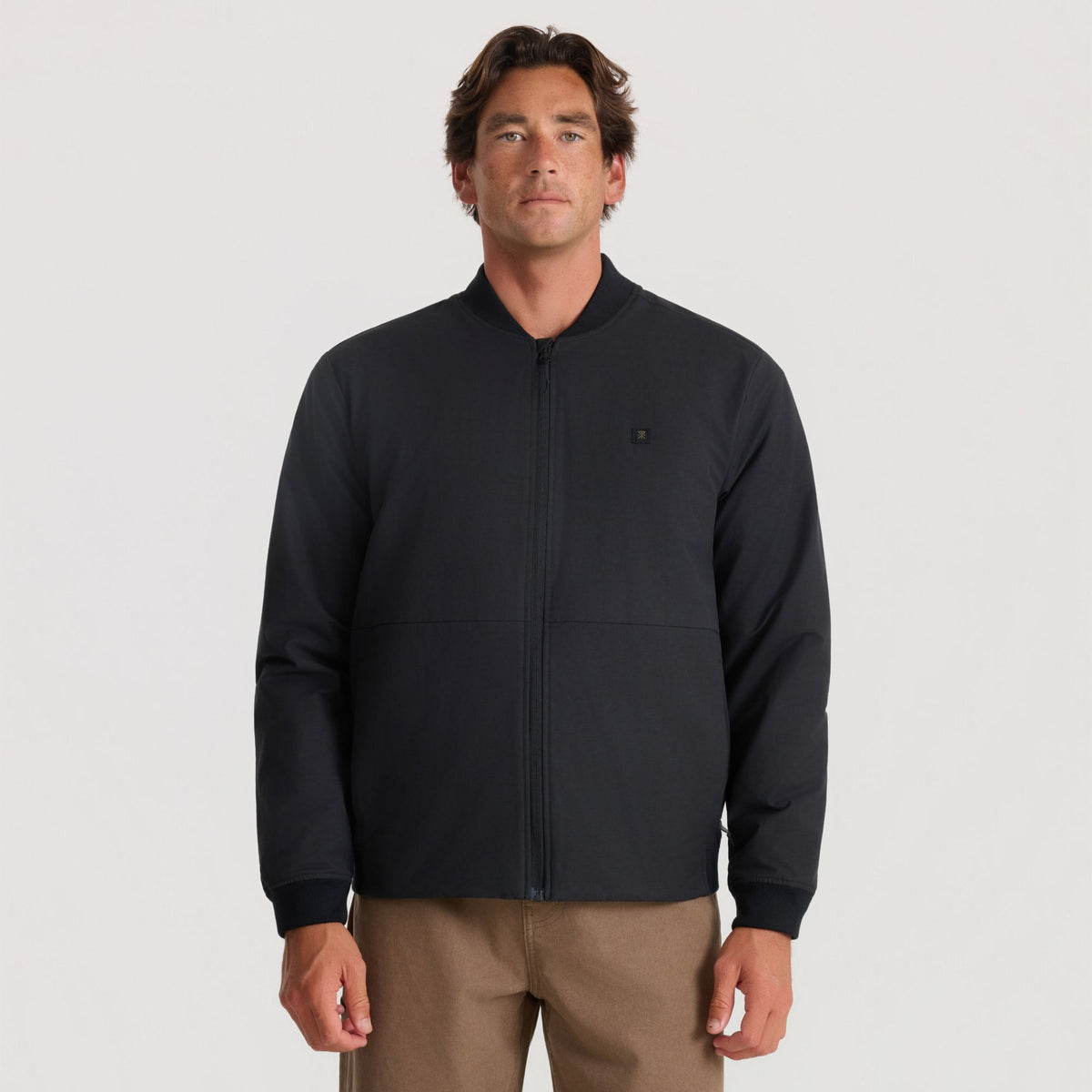 Men's zip-up bomber jacket with ribbed collar and cuffs, small chest logo patch