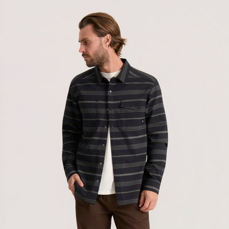 Men's long sleeve striped button-up shirt with dual chest pockets and snap closures