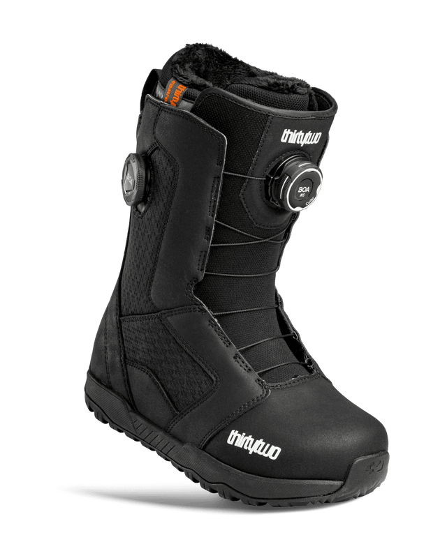 ThirtyTwo STW Double BOA women's black snowboard boot with dual BOA dials and faux fur lining