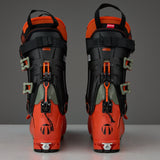 Rear view of a pair of alpine touring ski boots with buckle closure system and RECCO reflector