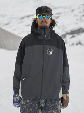 Armada Ansel 2L men's black and gray shell jacket worn in snowy conditions