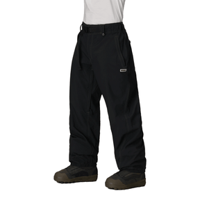Men's baggy snow pants with belt, contrast stitching, and snowboard boot-compatible hem.
