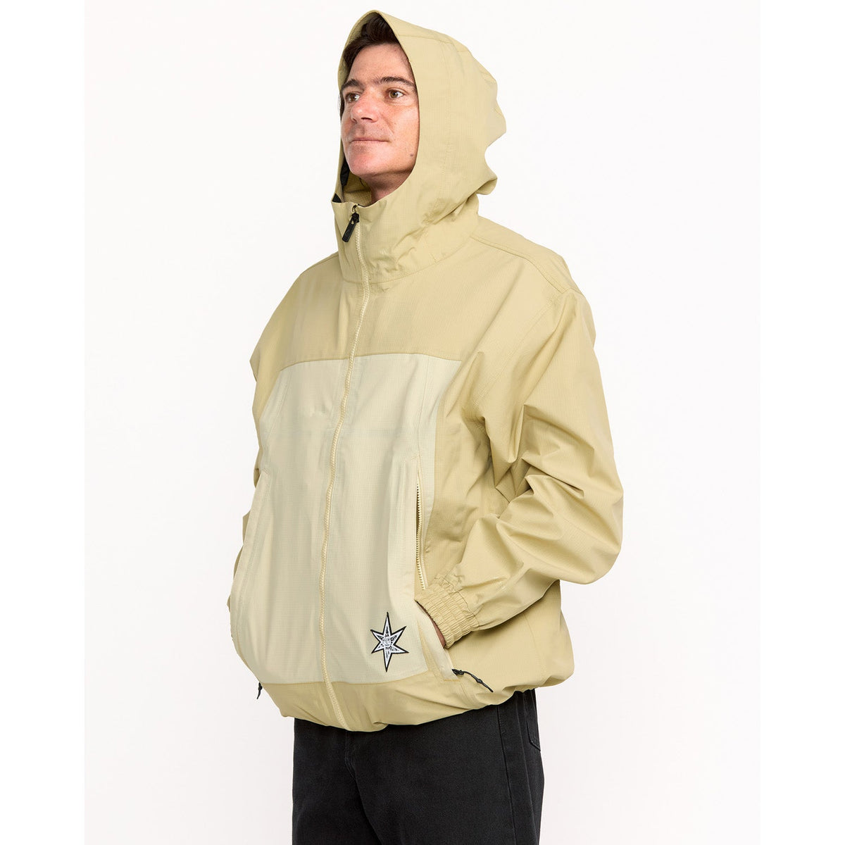 Men's hooded zip-up shell jacket with two-tone colorblock design and star logo patch