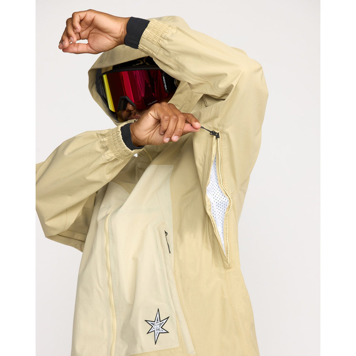 Volcom men's hooded shell jacket with underarm ventilation zip and star logo patch