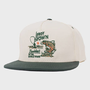 Cream and forest green snapback hat with embroidered fishing and trout graphic