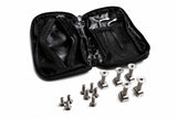 Black zip case open beside titanium bolts, T-nuts, and tools for hydrofoil setup